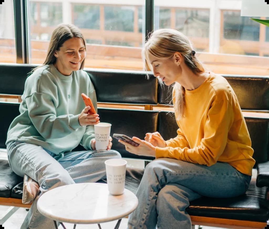 Teammates reviewing insights on their phones