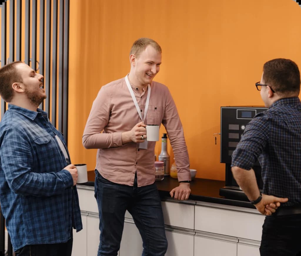 CSAgentIQ colleagues chatting over coffee